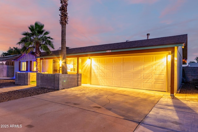 3643 E Friess Dr, Phoenix, AZ 85032 - ranch-style house featuring concrete driveway and a garage