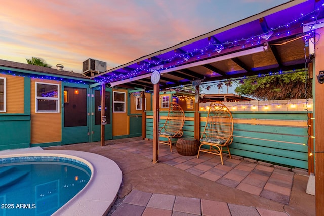 3643 E Friess Dr, Phoenix, AZ 85032 - view of swimming pool featuring central AC and a patio area