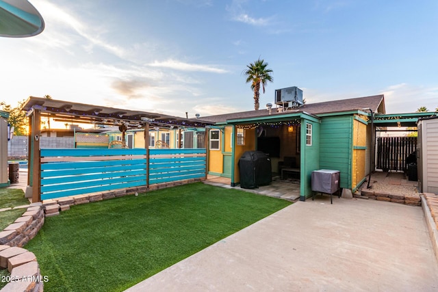 3643 E Friess Dr, Phoenix, AZ 85032 - view of yard with an outbuilding, a patio, and central air condition unit