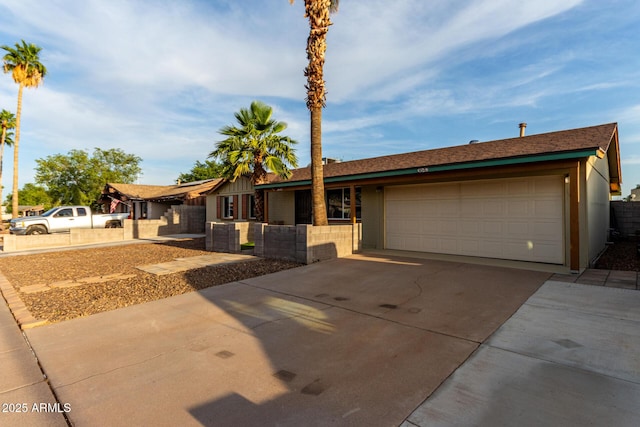 3643 E Friess Dr, Phoenix, AZ 85032 - single story home with concrete driveway and an attached garage
