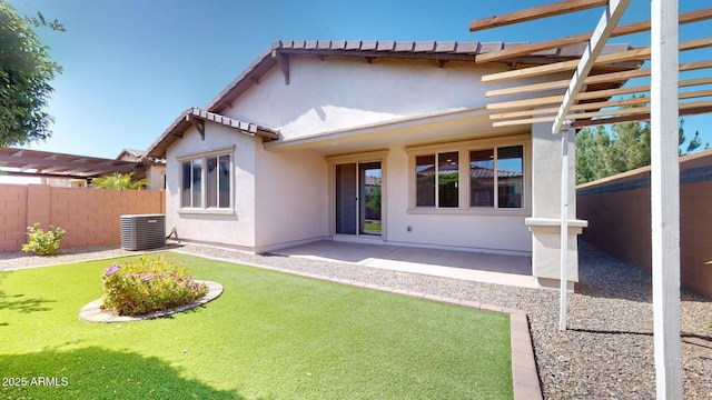 back of house with central AC, fence, a patio, a pergola, and stucco siding