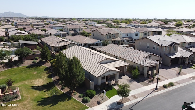 bird's eye view with a residential view and a mountain view