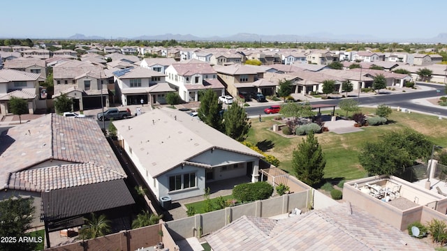 birds eye view of property with a residential view and a mountain view