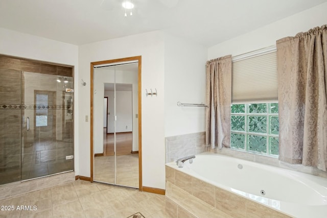 bathroom with tile patterned floors and plus walk in shower