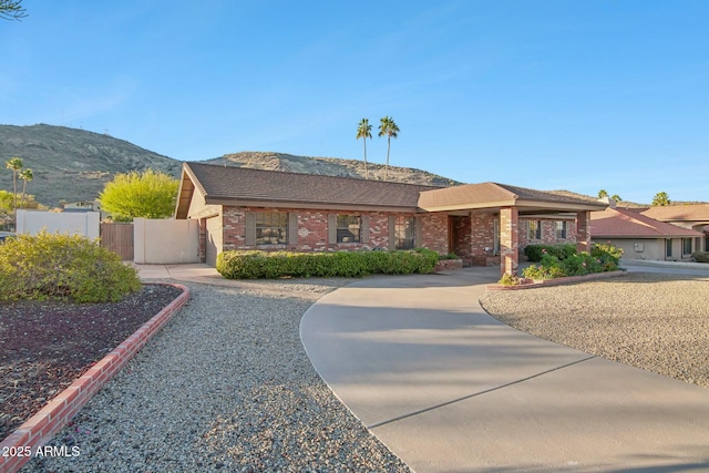 ranch-style house featuring a mountain view