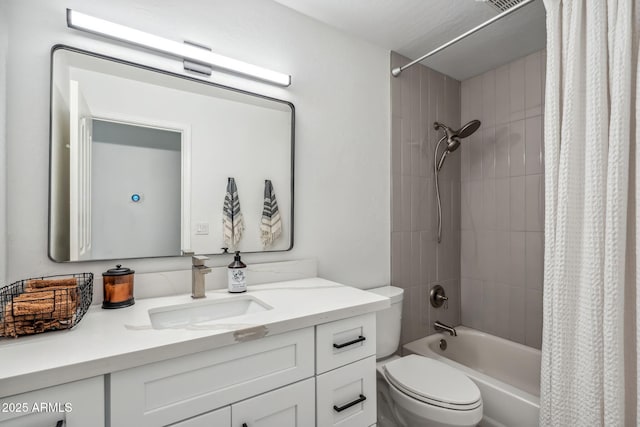 full bath with shower / bath combo with shower curtain, toilet, and vanity