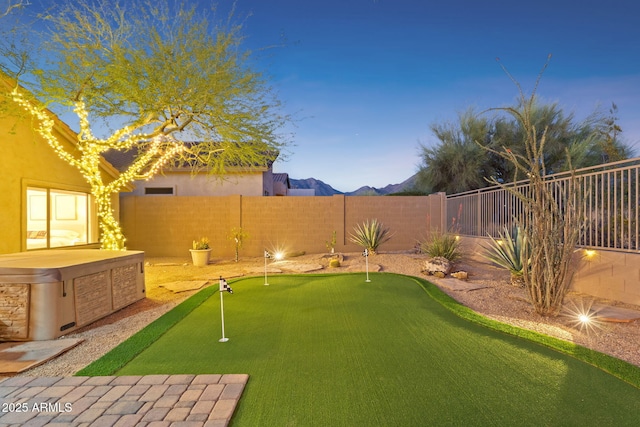view of yard with a fenced backyard