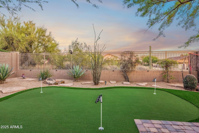view of home's community featuring a fenced backyard