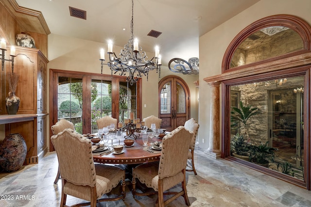 tiled dining space with a notable chandelier and high vaulted ceiling