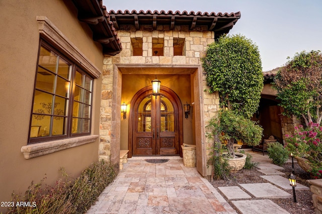 doorway to property featuring french doors