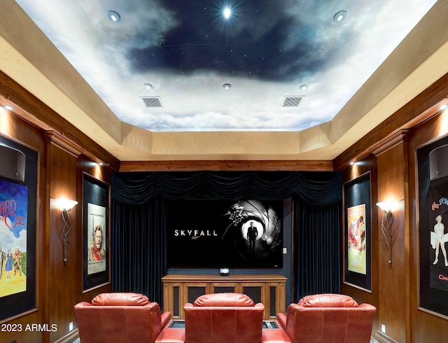 home theater room featuring a tray ceiling