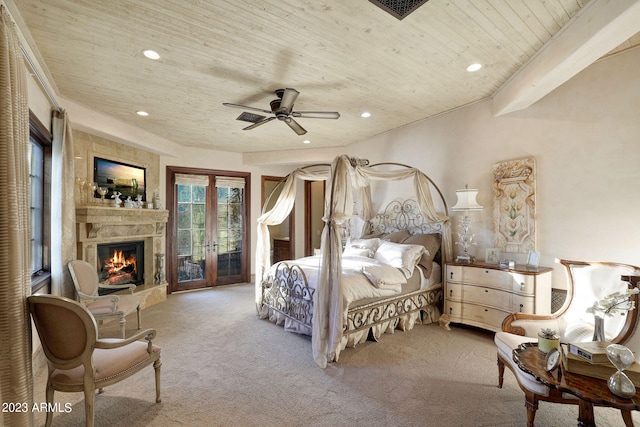 carpeted bedroom featuring french doors, access to outside, and ceiling fan