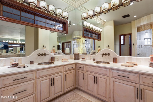 bathroom featuring double sink vanity, tile floors, and backsplash