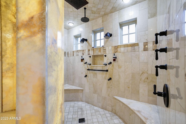 bathroom featuring tiled shower