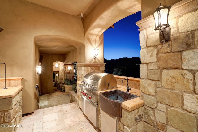 interior space featuring a mountain view and tile floors