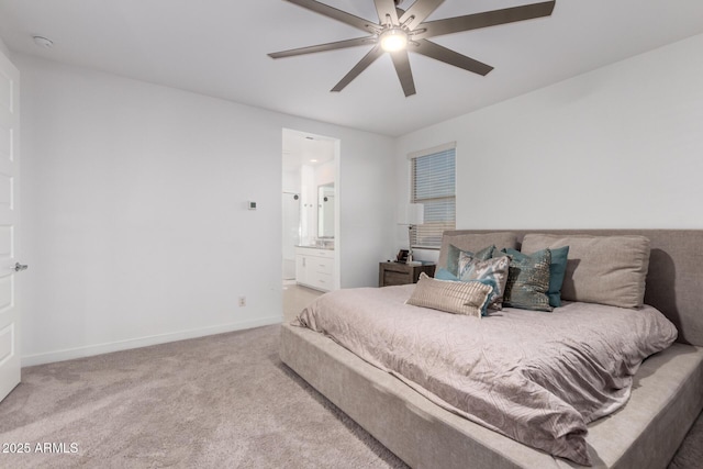 5897 N 195th Dr, Litchfield Park, AZ 85340 - bedroom featuring carpet, connected bathroom, baseboards, and a ceiling fan
