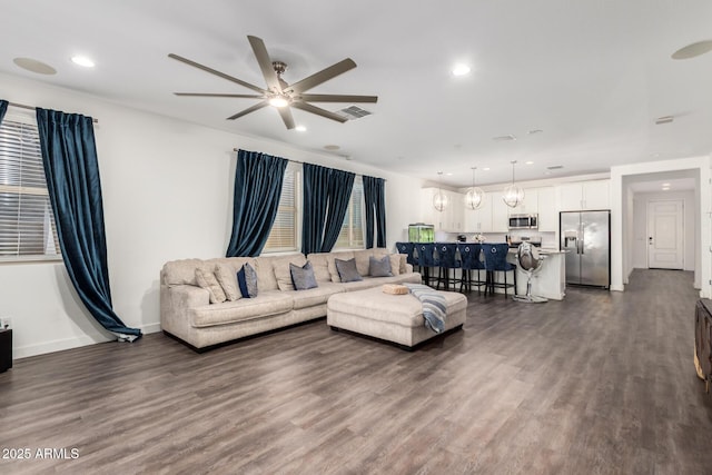 5897 N 195th Dr, Litchfield Park, AZ 85340 - living room featuring a ceiling fan, dark wood-style floors, recessed lighting, and baseboards