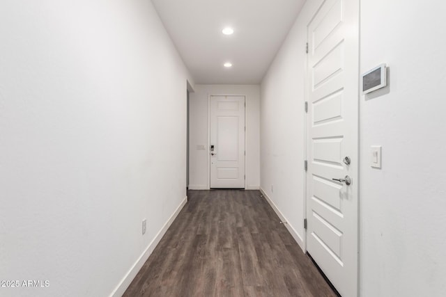 5897 N 195th Dr, Litchfield Park, AZ 85340 - corridor featuring dark wood-type flooring, baseboards, and recessed lighting