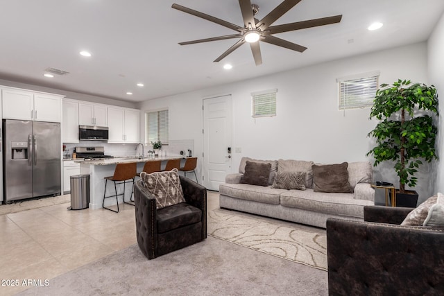 5897 N 195th Dr, Litchfield Park, AZ 85340 - living room with ceiling fan and recessed lighting