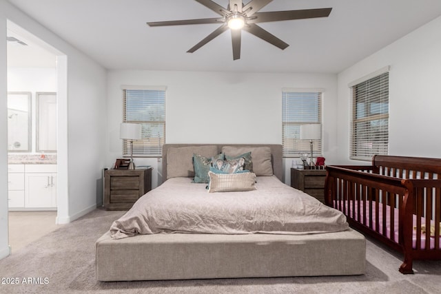 5897 N 195th Dr, Litchfield Park, AZ 85340 - bedroom featuring carpet floors, ensuite bathroom, ceiling fan, and baseboards