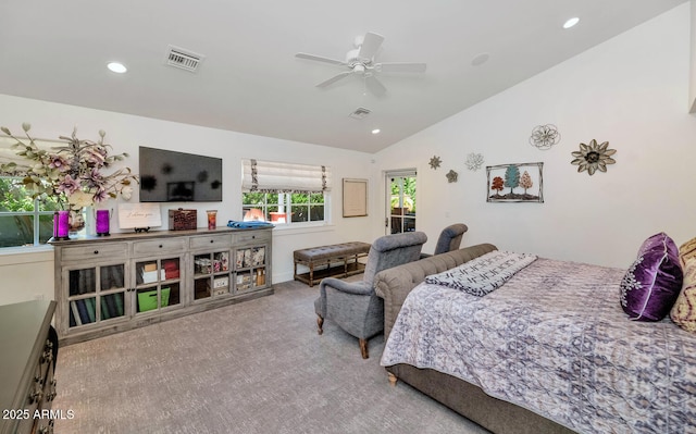 carpeted bedroom featuring ceiling fan and lofted ceiling