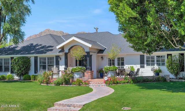 ranch-style home with a front yard