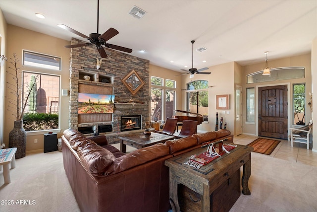 41910 N Long Cove Way, Anthem, AZ 85086 - living room with light colored carpet, a ceiling fan, and visible vents