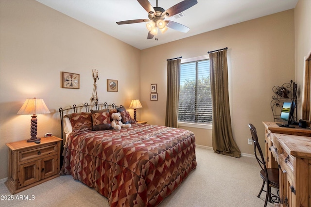 41910 N Long Cove Way, Anthem, AZ 85086 - bedroom with baseboards, a ceiling fan, and light carpet