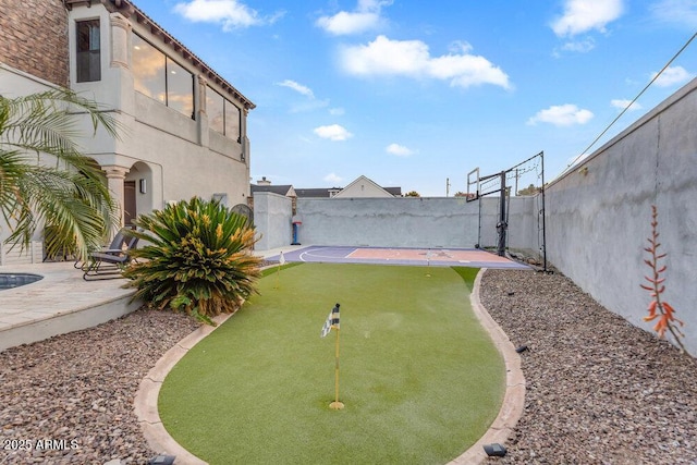 view of yard with a fenced backyard