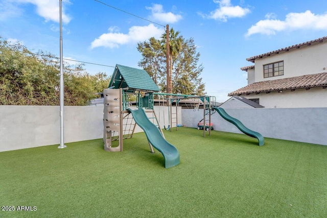 view of playground with fence