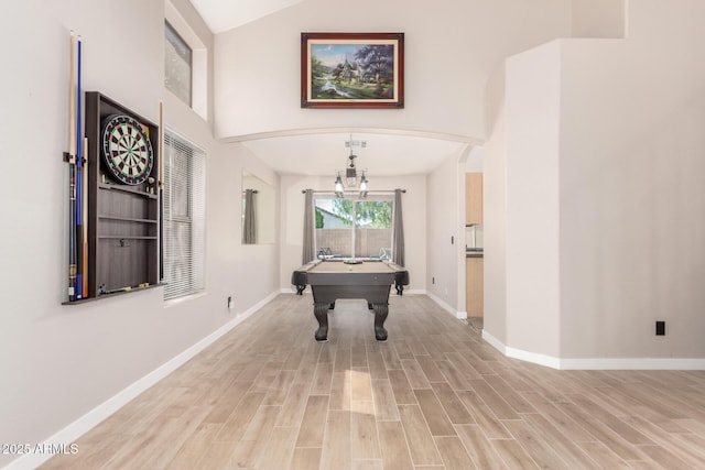 rec room featuring baseboards, pool table, light wood-style flooring, and lofted ceiling