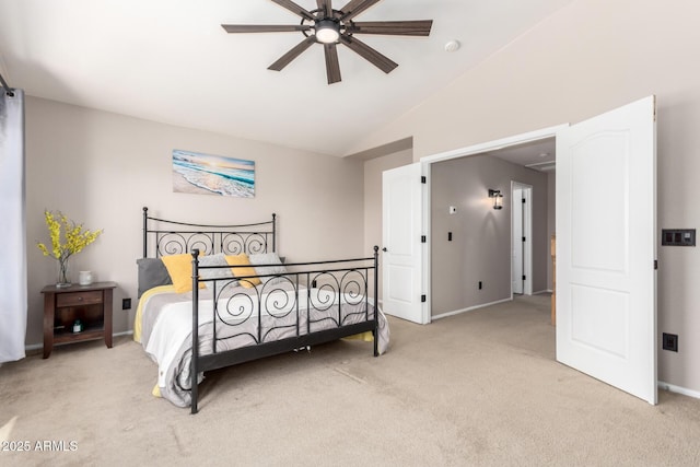 bedroom featuring light carpet, vaulted ceiling, baseboards, and a ceiling fan