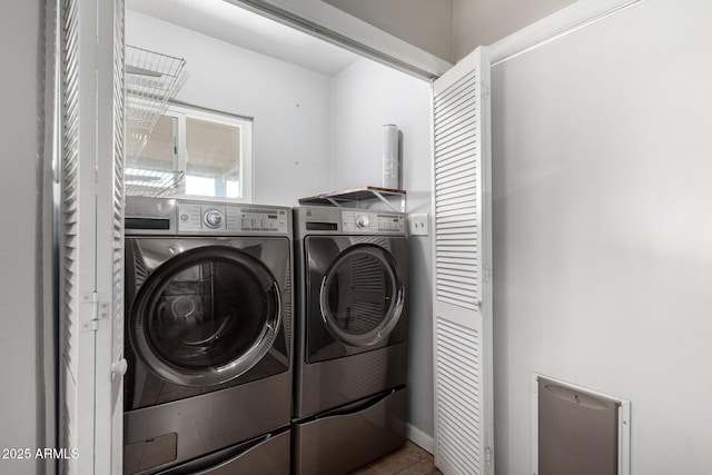 washroom featuring independent washer and dryer