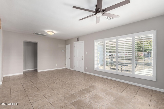 spare room featuring ceiling fan