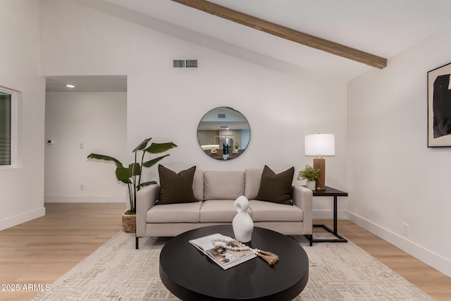 720 E Chilton Dr, Tempe, AZ 85283 - living area with light wood-style floors, beam ceiling, and high vaulted ceiling