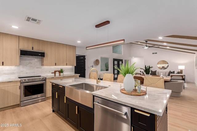 720 E Chilton Dr, Tempe, AZ 85283 - kitchen featuring stainless steel appliances, ventilation hood, open floor plan, light brown cabinets, and recessed lighting