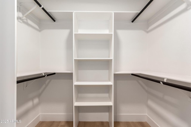720 E Chilton Dr, Tempe, AZ 85283 - spacious closet featuring wood finished floors