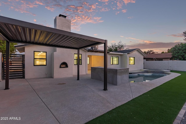 720 E Chilton Dr, Tempe, AZ 85283 - back of house featuring a chimney, a patio, a fenced backyard, and stucco siding