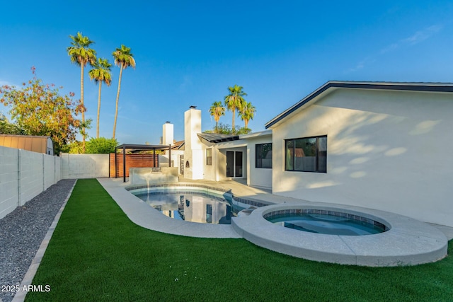 720 E Chilton Dr, Tempe, AZ 85283 - rear view of house featuring stucco siding, a chimney, a fenced backyard, a patio area, and a pool with connected hot tub