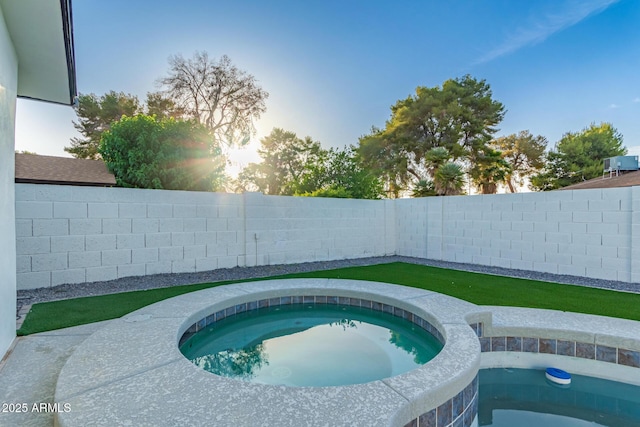 720 E Chilton Dr, Tempe, AZ 85283 - pool at dusk with an in-ground hot tub and a fenced backyard