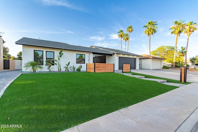 720 E Chilton Dr, Tempe, AZ 85283 - view of front of property with stucco siding, driveway, a garage, and a shingled roof