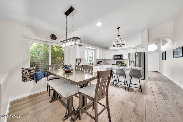 18644 N 21st St, Phoenix, AZ 85024 - dining space featuring a chandelier, baseboards, healthy amount of natural light, and recessed lighting