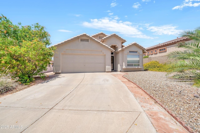 18644 N 21st St, Phoenix, AZ 85024 - view of front of property featuring stucco siding, an attached garage, concrete driveway, and a tiled roof