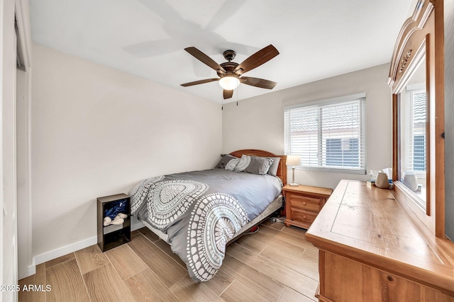 18644 N 21st St, Phoenix, AZ 85024 - bedroom featuring light wood-type flooring, ceiling fan, and baseboards