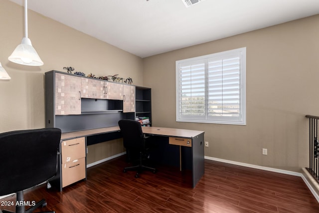 home office with dark wood-type flooring