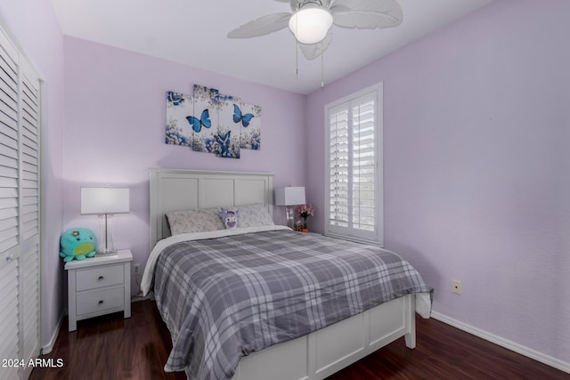 bedroom featuring dark hardwood / wood-style floors and ceiling fan