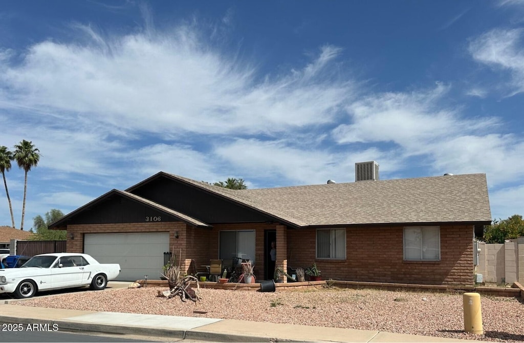 3106 E Grove Ave, Mesa, AZ 85204 - single story home featuring brick siding, a garage, and roof with shingles