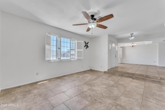 3046 E Dover St, Mesa, AZ 85213 - spare room with ceiling fan, tile patterned flooring, and a chandelier