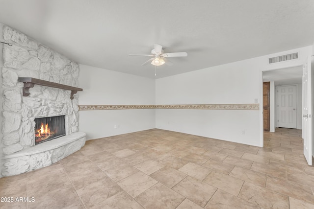 3046 E Dover St, Mesa, AZ 85213 - unfurnished living room with a ceiling fan and a fireplace