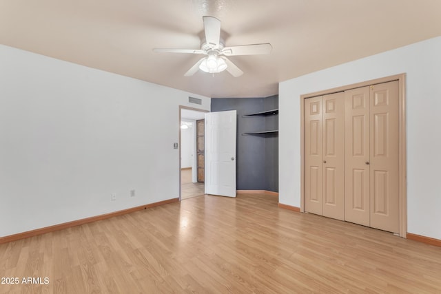3046 E Dover St, Mesa, AZ 85213 - unfurnished bedroom featuring light wood-style flooring, two closets, and ceiling fan